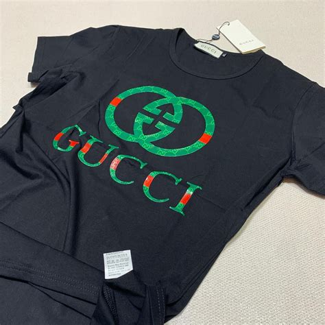 gucci maglietta con scritte|Maglioni da donna di Gucci .